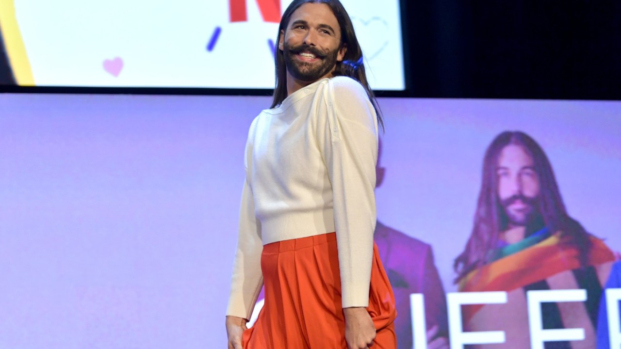 Jonathan Van Ness on stage during a Queer Eye panel.