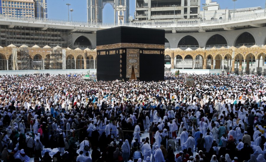 crowds of people make hajj at mecca