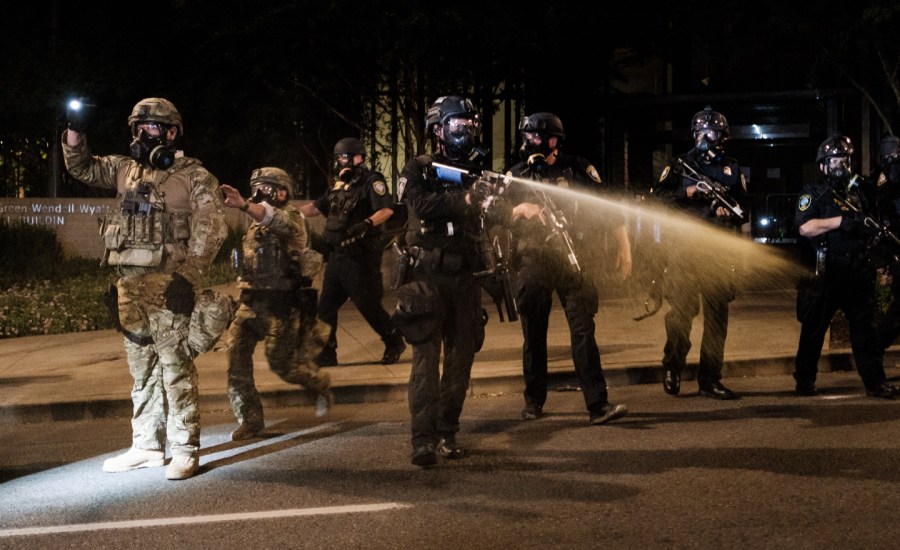 Federal officers use tear gas and other crowd dispersal munitions on protesters outside the Multnomah County Justice Center on July 17, 2020 in Portland, Oregon