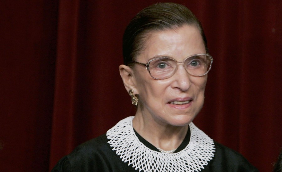 ruth bader ginsburg in her justice robes with a white collar