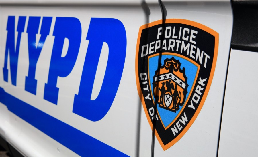 New York Police Department Sign with Logo on Police Patrol Car