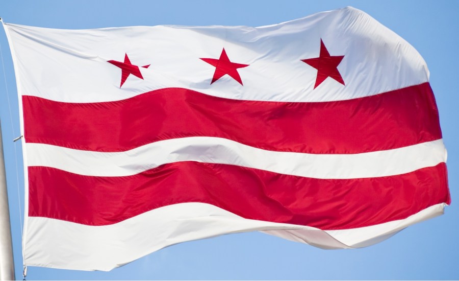 A closeup of the red and white flag of the District of Columbia also known as Washington DC or the Nations Capital. This flag was blowing in a stiff breeze.