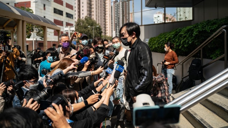 Mike Lam King-nam, who participated in the pro-democracy primary elections, speaks to members of media outside of the Ma On Shan Police Station on February 28, 2021 in Hong Kong, China.