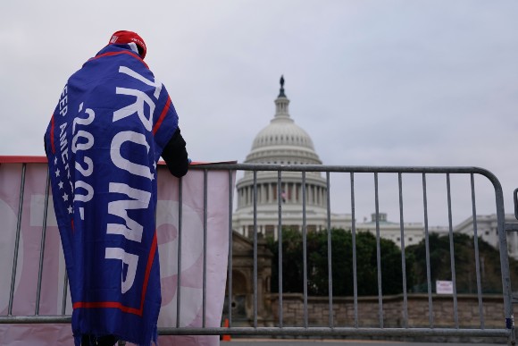 A lone Trump supporter outside the Capitol