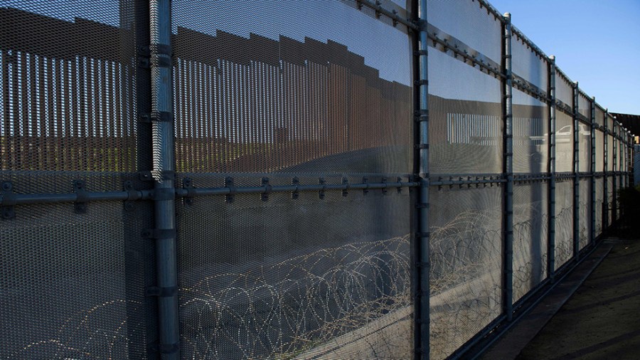 Border wall fencing