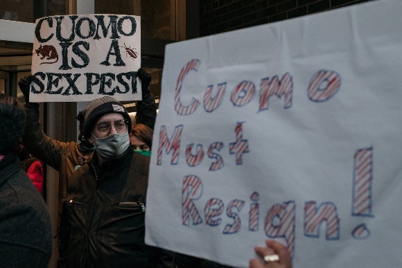 Protesters call for New York Gov. Andrew Cuomo (D) to resign.