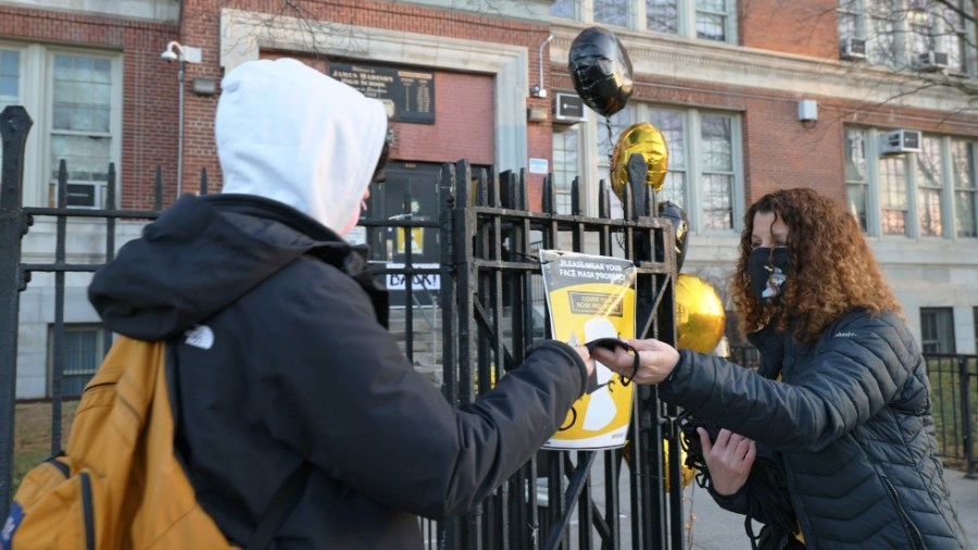 A New York City high school principal welcomes a student