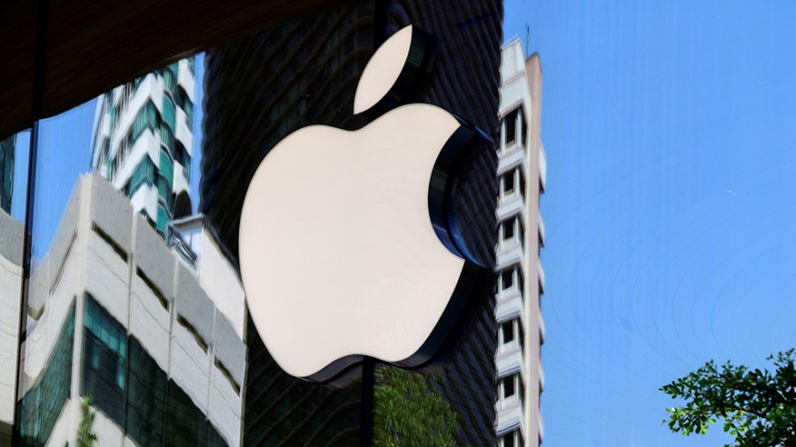 Apple logo on the window of a company store