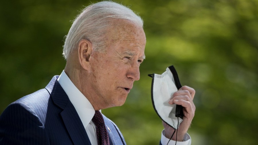 President Biden speaks with reporters outside the White House