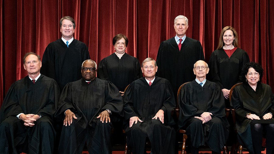 Supreme Court Justices pose for group photo with newly sworn in Justice Amy Coney Barrett on April 23, 2021