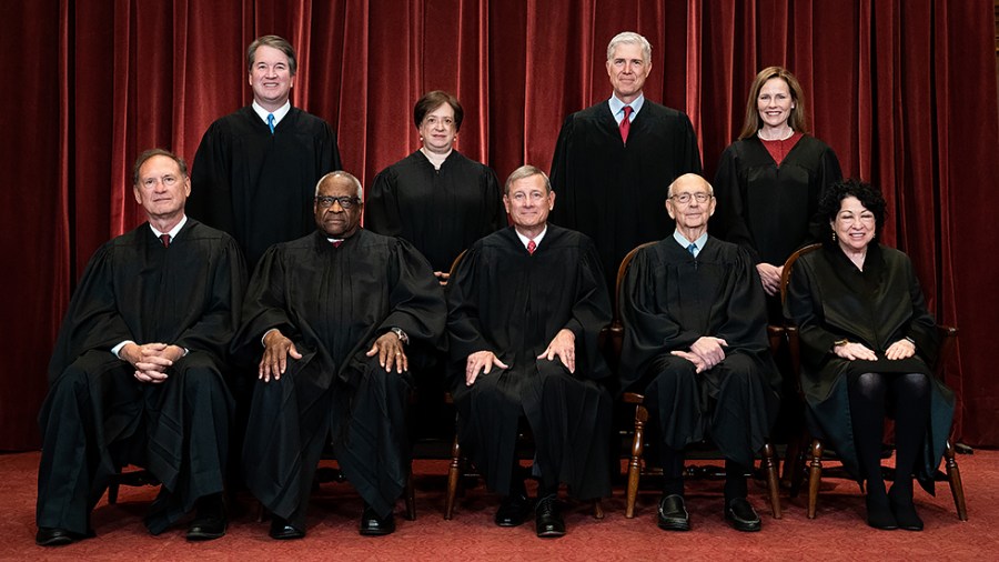 Supreme Court Justices pose for group photo with newly sworn in Justice Amy Coney Barrett on April 23, 2021