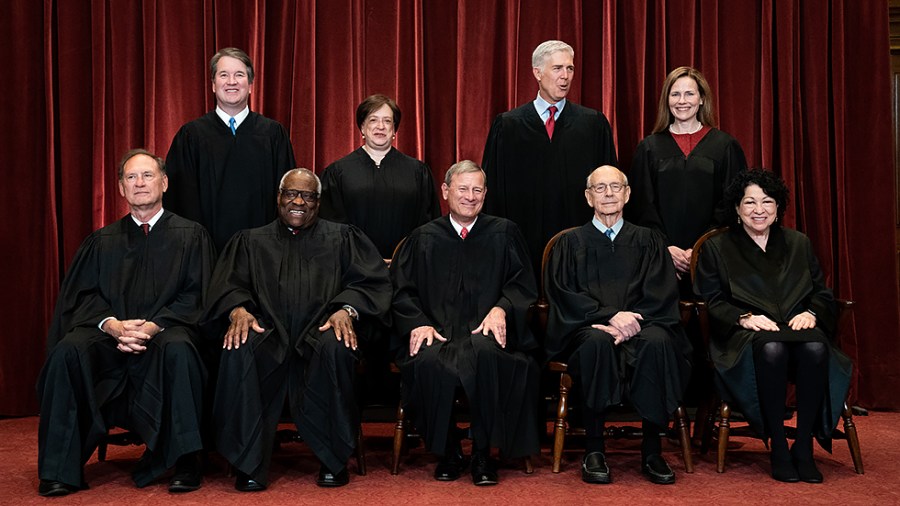 Supreme Court Justices pose for group photo with newly sworn in Justice Amy Coney Barrett on April 23, 2021