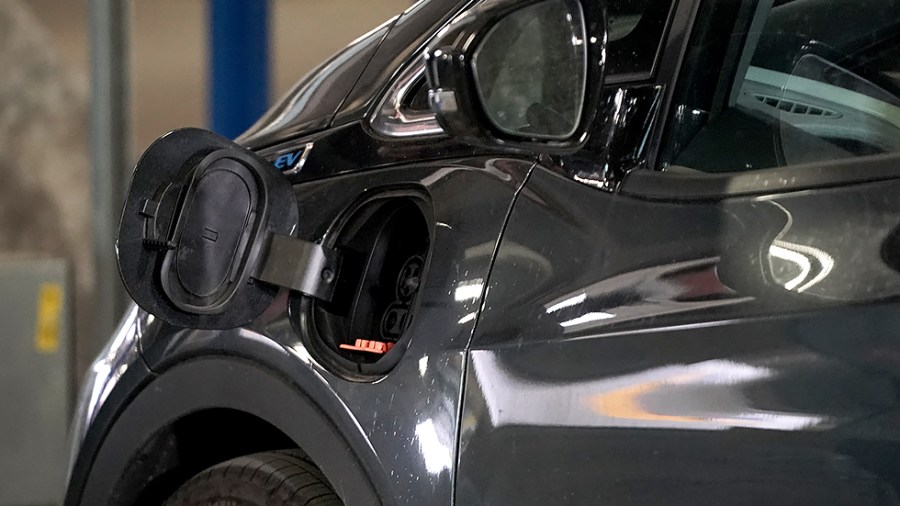 A Chevy Bolt uses an EVGo charger at Union Station in Washington, D.C.