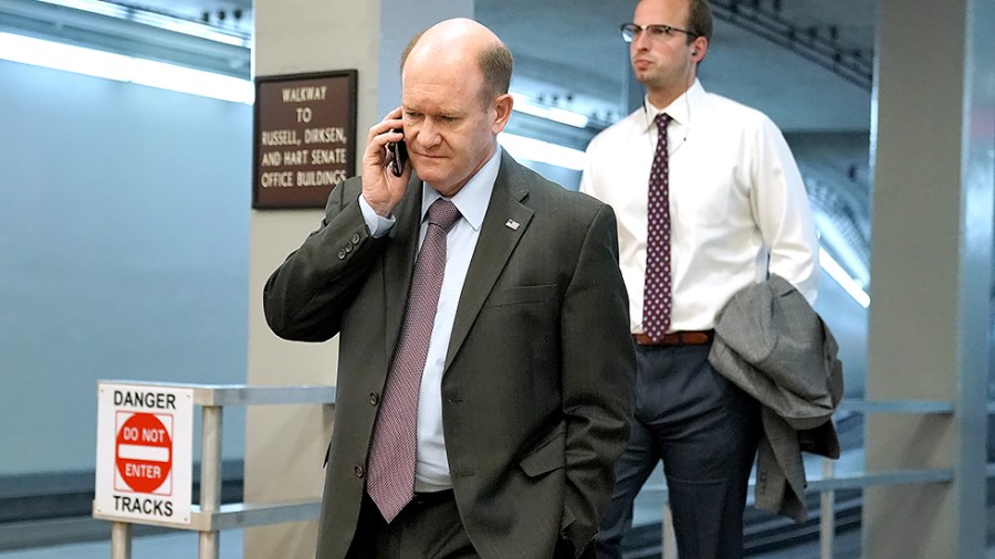 Sen. Chris Coons (D-Del.) arrives to the Capitol for a series of votes on May 27