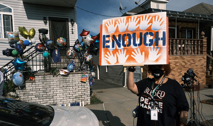 Community members attend a peace vigil to end gun violence in New York