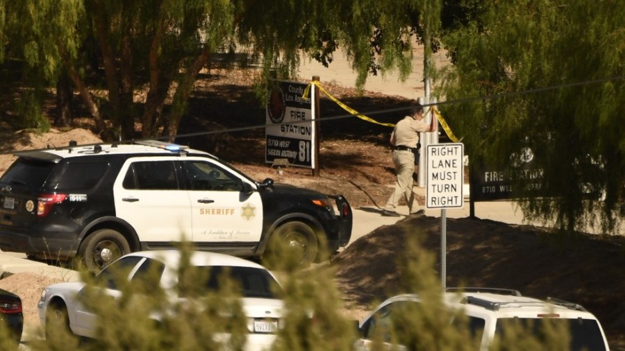 A Los Angeles County Sheriff department vehicle is seen after a shooting left one firefighter dead in Agua Dulce, Calif.