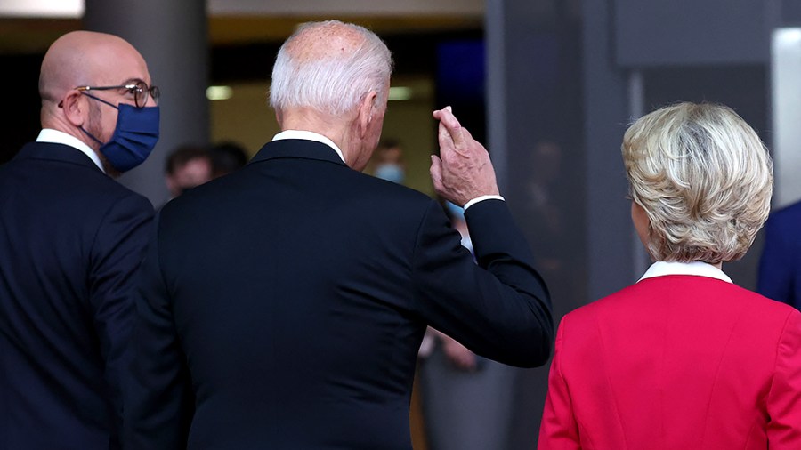 President Biden crosses his fingers when asked about the Boeing-Airbus trade dispute in Brussels, Belgium on June 15