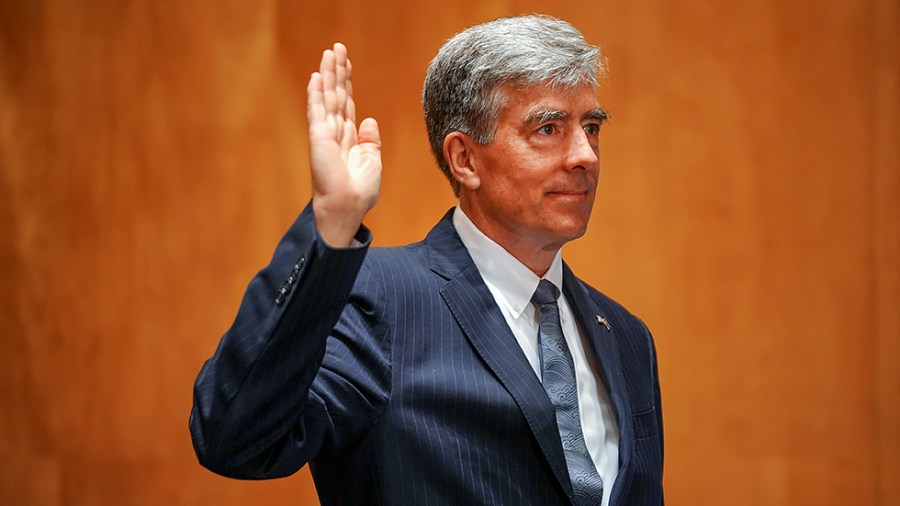 Nominee for National Cyber Director Chris Inglis is sworn in on June 10