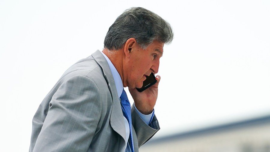 Sen. Joe Manchin (D-W.Va.) arrives at the Capitol for a nomination vote on June 21