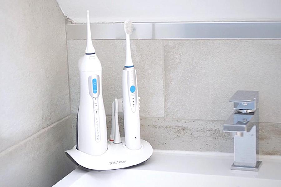 Upgrade your oral health with savings on this water flosser, sonic toothbrush combo