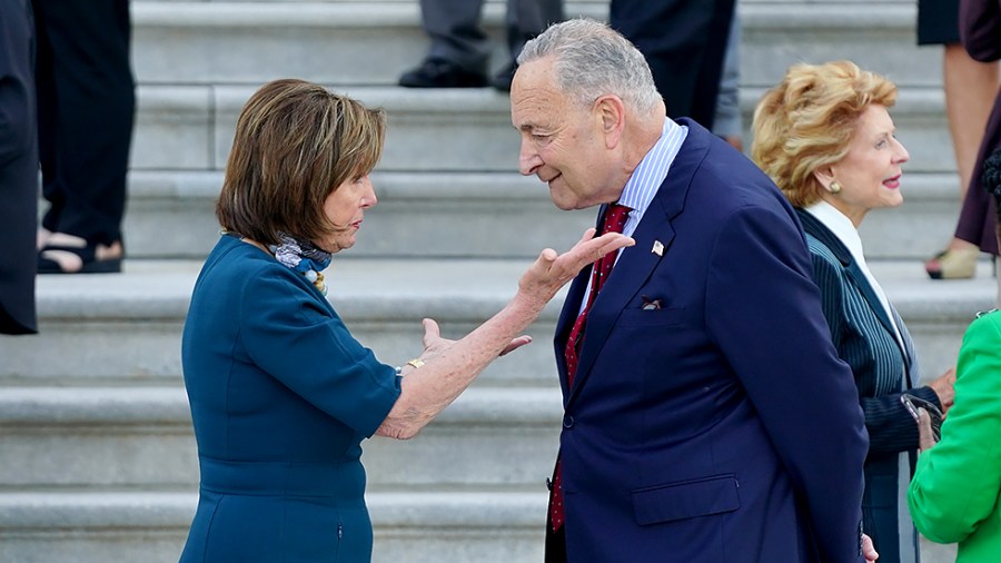 Speaker Nancy Pelosi (D-Calif.) speaks to Majority Leader Charles Schumer (D-N.Y.)