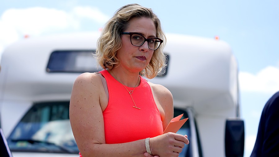 Sen. Kyrsten Sinema (D-Ariz.) returns from the White House on June 24 where they reached a deal on an infrastructure plan