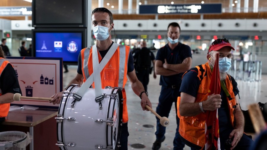 Protesters block the gates to a passport control in Paris, France on July 02, 2021