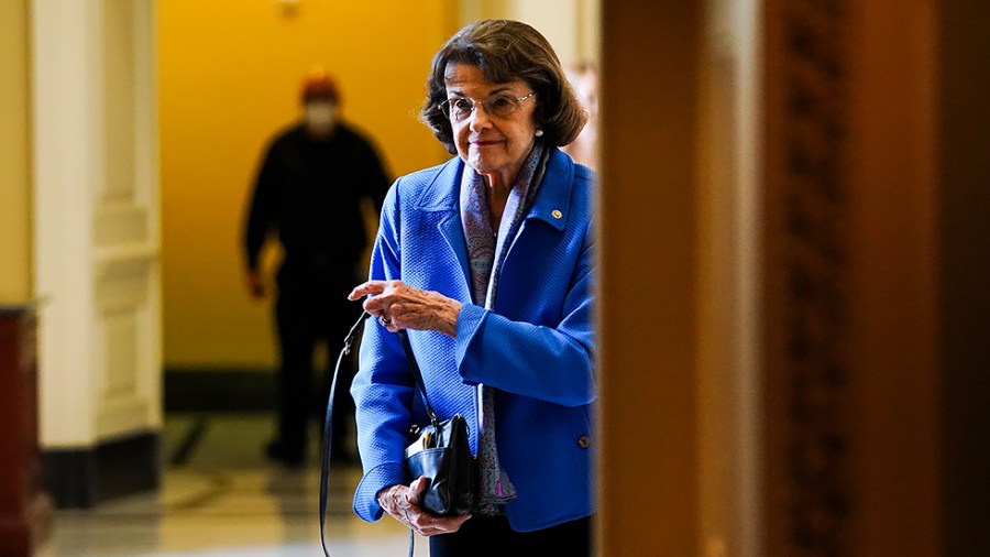 Sen. Dianne Feinstein (D-Calif.) leaves the weekly Senate Democratic policy luncheon on June 15.