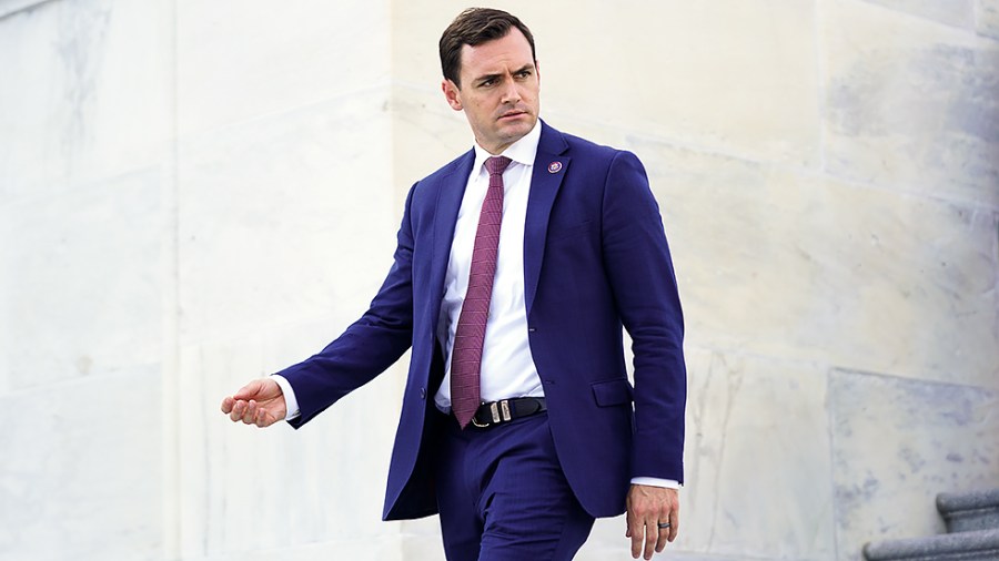 Rep. Mike Gallagher (R-Wis.) leaves the the House Chamber following a series of votes on June 24.