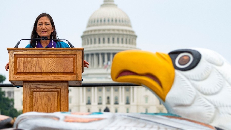 Secretary of the Interior Deb Haaland speaks at the Red Road to D.C. Totem Pole Journey in front of the Capitol