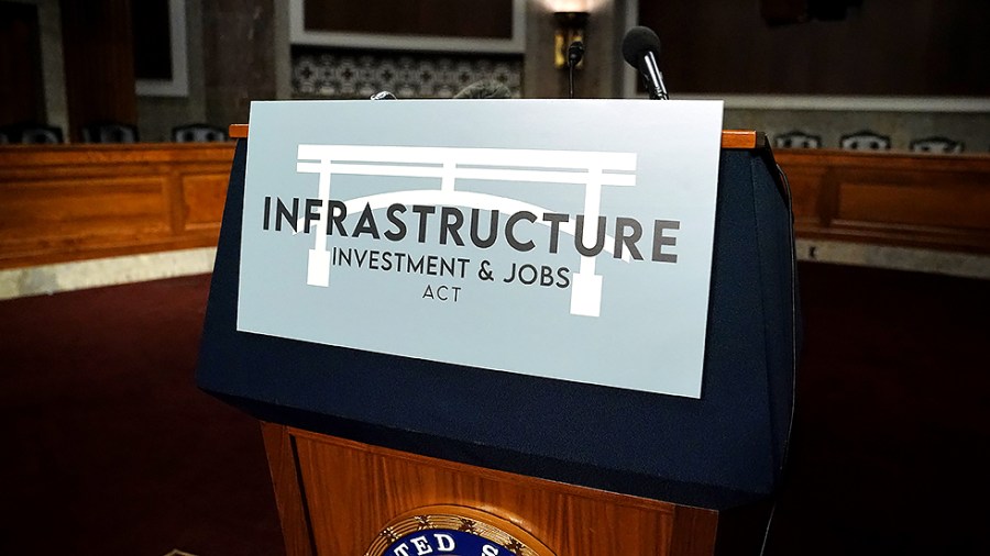 A podium is seen before a group of bipartisan senators addresses reporters after a key vote regarding infrastructure legislation on Wednesday, July 28, 2021.