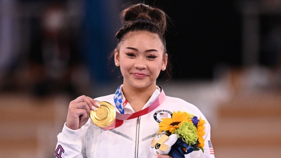 USA's Sunisa Lee poses with her gold medal.