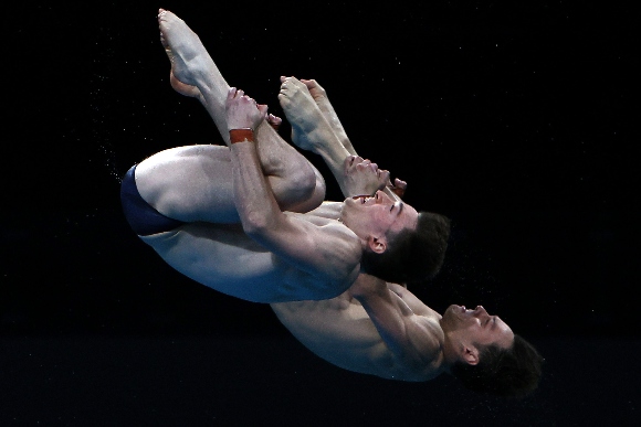 Tom Daley and Matty Lee of Team Great Britain compete in the Men's Synchronised 10m Platform Final