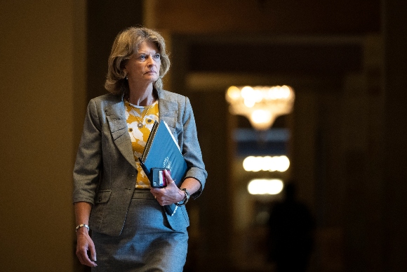 Sen. Lisa Murkowski (R-AK) walks to a lunch meeting with Senate Republicans