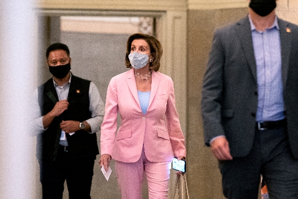 Speaker Nancy Pelosi (D-Calif.) walks through the Capitol