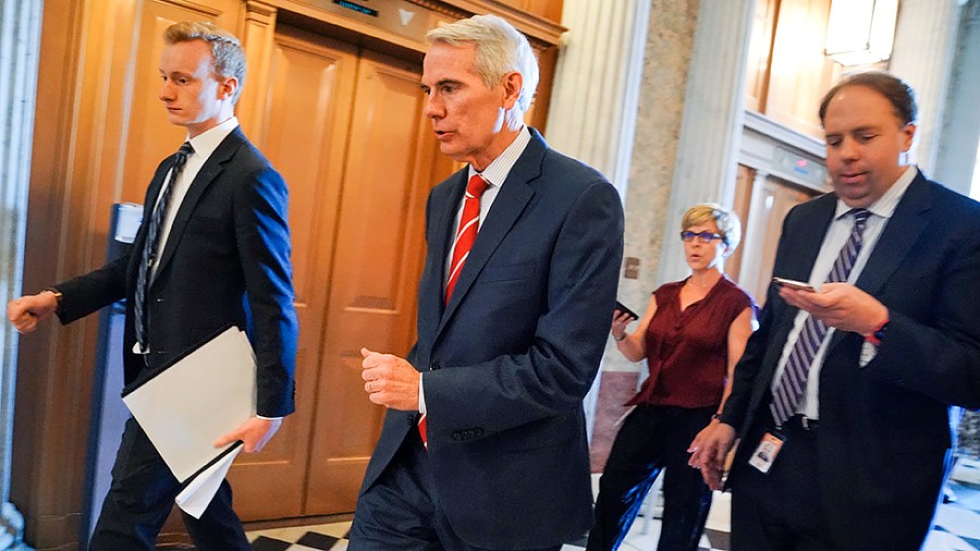 Sen. Rob Portman (R-Ohio) arrives for a vote on July 13