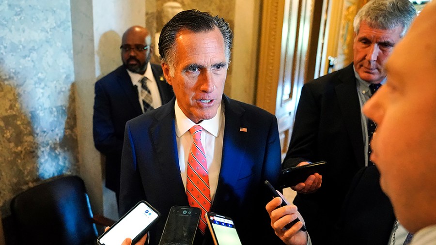 Sen. Mitt Romney (R-Utah) arrives for a vote on July 13