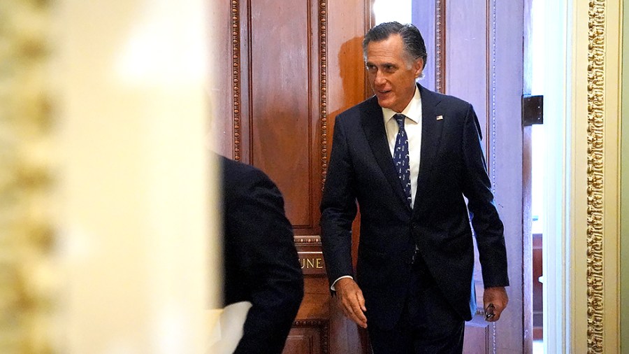 Sen. Mitt Romney (R-Utah) leaves Sen. John Thune’s (R-S.D.) office before the weekly Senate Republican policy luncheon on Tuesday, July 20, 2021.