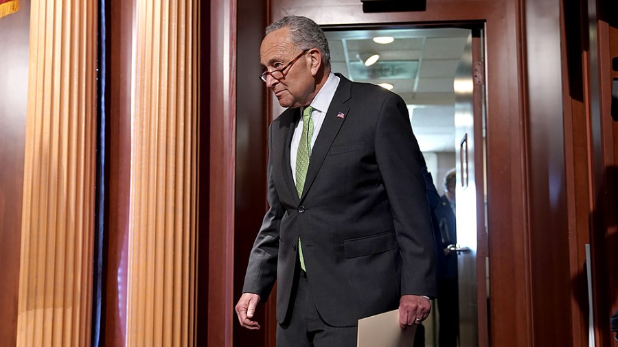 Majority Leader Charles Schumer (D-N.Y.) arrives for a press conference on July 15 to discuss the Child Tax Credit payments being sent out.