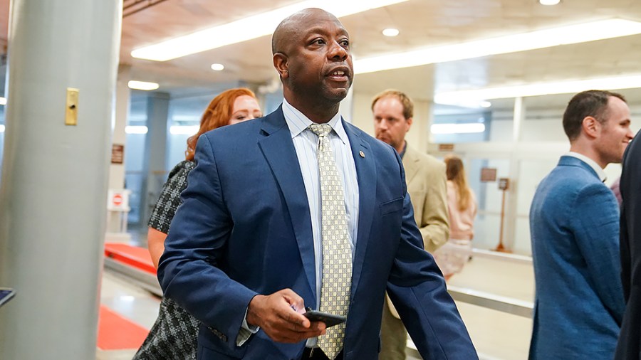 Sen. Tim Scott (R-S.C.) arrives to the Capitol for a vote on Tuesday, July 27, 2021.