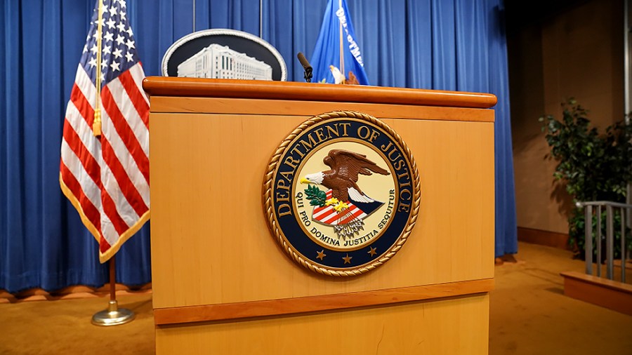 The Department of Justice logo is seen at their headquarters in Washington, D.C., on Thursday, August 5, 2021 prior to a press conference regarding a civil rights matter.