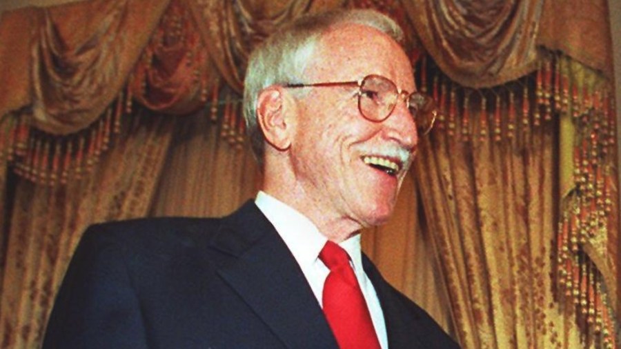 James Hormel celebrates after being sworn in as U.S. ambassador to Luxembourg in 1999