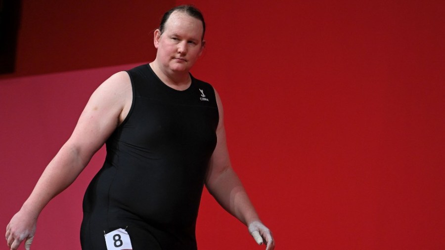 Olympian Laurel Hubbard reacts in the women's +87kg weightlifting competition during the Tokyo 2020 Olympic Games