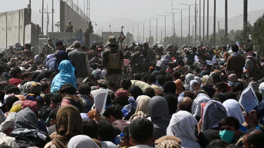 Crowds gather outside the Kabul airport