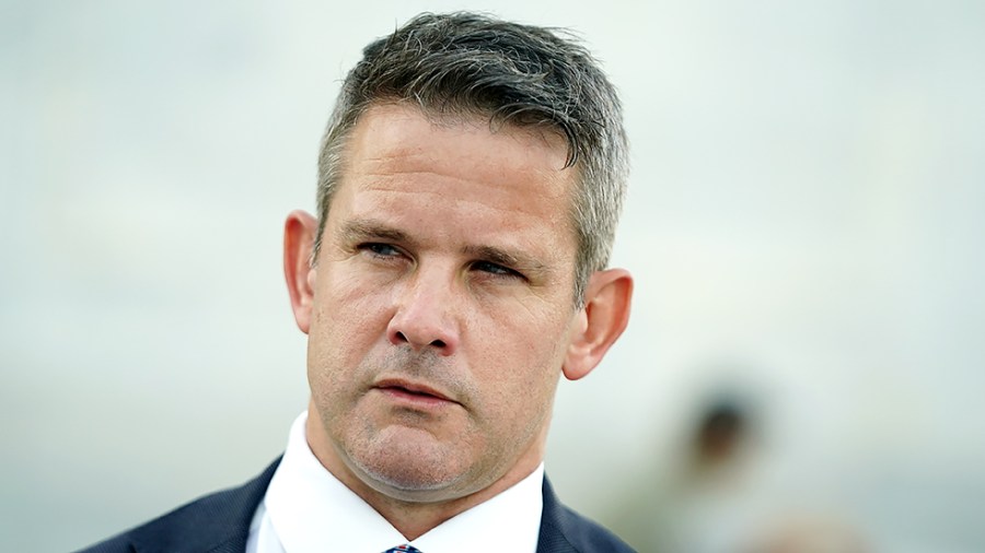 Rep. Adam Kinzinger (R-Ill.) speaks to to a reporter outside the House Chamber on Monday, August 23, 2021.