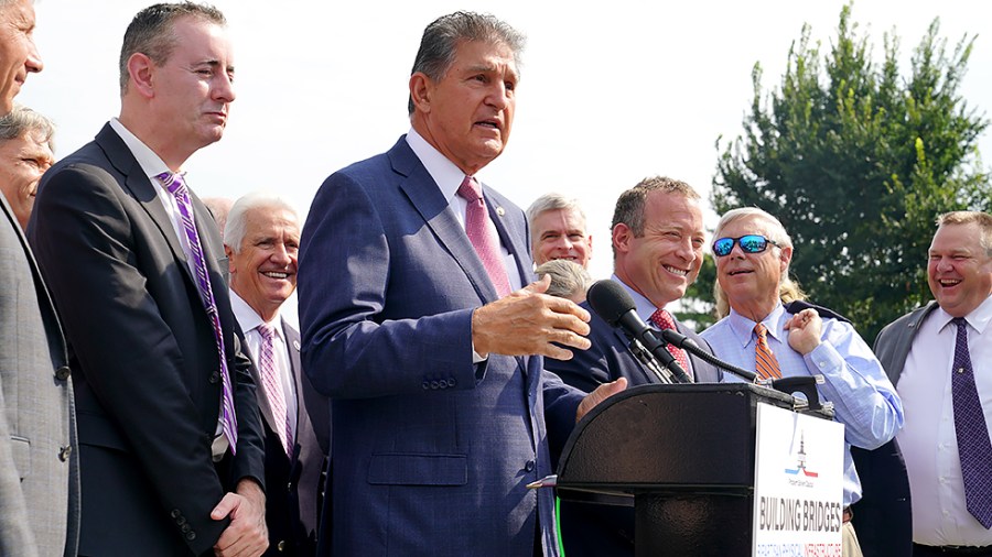 Sen. Joe Manchin (D-W.Va.) addresses reporters during a press conference on Friday, July 30, 2021 to discuss the bipartisan infrastructure deal with members of the Problem Solvers Caucus.