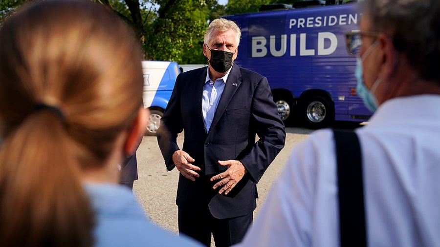 Virginia Democratic gubernatorial candidate Terry McAuliffe addresses reporters at the first stop of the ‘DNC Build Back Better Bus Tour’ at Port City Brewing in Alexandria, Va., on Thursday, August 12, 2021.