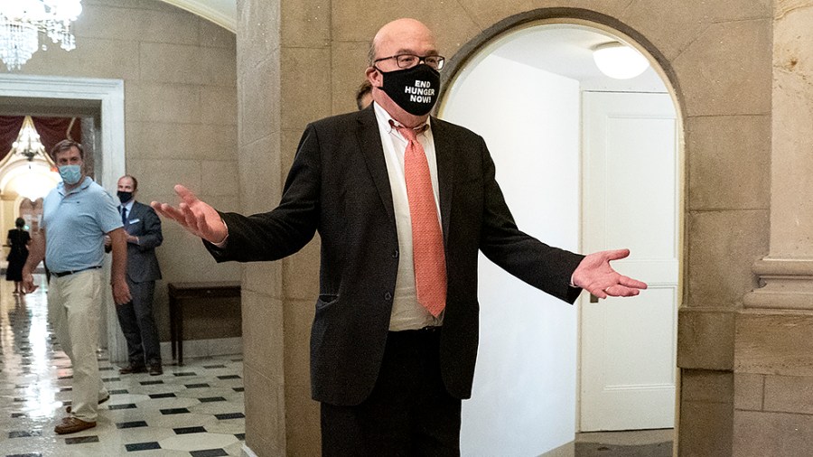 Rep. James McGovern (D-Mass.) shrugs when asked if there would be a vote on the budget and infrastructure bill as he arrives for a meeting in Speaker Nancy Pelosi’s (D-Calif.) office on Monday, August 23, 2021.