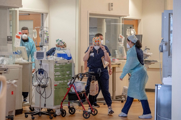 Healthcare workers are seen inside the Covid Intensive Care Unit in North Oaks Hospital in Hammond, Louisiana