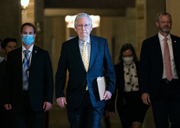 Senate Minority Leader Mitch McConnell (R-KY) walks to the Senate Chambers at the U.S. Capitol